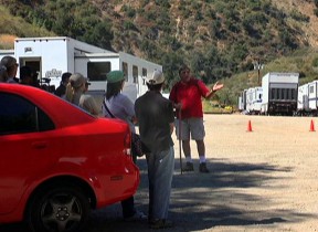 7/24/2011: The writer gives a tour against a backdrop of honey wagons and production trucks for the film currently titled "Mentryville."