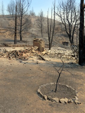 Site of a home that burned down Saturday night on Newview Road in Lake Hughes.