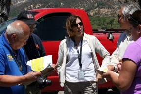 Virgilio “Gil” Macion of the U.S. Small Business Administration (far left) , Michael Hooper of the Los Angeles County Office of Emergency Management, Sonia Brown of the Cal EMA Southern Region, Francis Dominguez of the Los Angeles County Department of Public Works and Theresa Gonzales of Cal EMA discuss property impacted by the Powerhouse Fire during a joint Preliminary Damage Assessment conducted by Cal EMA and the SBA on June 17 to verify fire-related damages. CalEMA