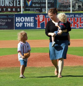 Benjamin throws out the first pitch at a Jethawks game for his second birthday.