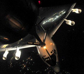 A KC-135 Stratotanker refuels a Joint Surveillance Terminal Attack Radar System (JSTARS) over Iraq, Dec. 18, 2011. The JSTARS mission was the last over Iraq during Operation New Dawn. The JSTARS provided airborne, stand-off range, surveillance and target acquisition radar, and command and control capabilities to ground personnel. (U.S. Air Force photo/Senior Airman Tyler Placie) 