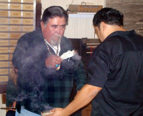 Charlie Cooke, left, performs the blessing at the SCV Historical Musuem upon the transference of artifacts from Newhall Land's River Village development site in 2007, Receiving the blessing is Rudy Cook Jr., current tribal captain of the Fernandeño-Tataviam Band of Mission Indians.