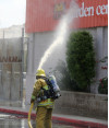 Firefighters Do It at Abandoned Store