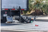Motorcyclist Hospitalized After Collision with Truck
