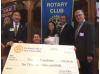 Rotarians Give $10,000 to Triumph Foundation After Devastating Fire