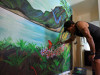 Artist Completes New Mural at Domestic Violence Center