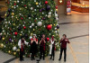 Carolers at Valencia Town Center Bring Holiday Cheer