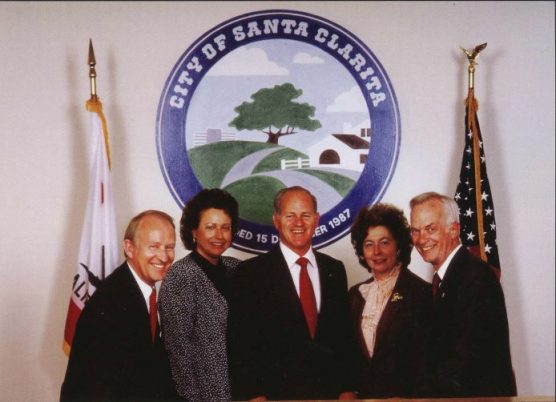At City Hall, the first City Council of the City of Santa Clarita, circa 1987. From left, Mayor Howard "Buck" McKeon, Mayor Pro-Tern Jan Heidt, Councilmembers Dennis Koontz, Jo Anne Darcy and Carl Boyer.