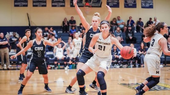 Freshman Anika Neuman (21) has been the Mustangs' go-to option in the post this season. She's second on the team in scoring and first in rebounds.