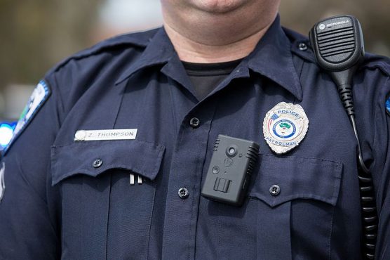 body cameras and criminal justice - A police officer in North Charleston, South Carolina wears a body camera. | Photo: Ryan Johnson/WMC.