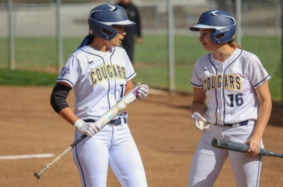 College of the Canyons shortstop Danielle Chatman and outfielder Heidi Ludy.