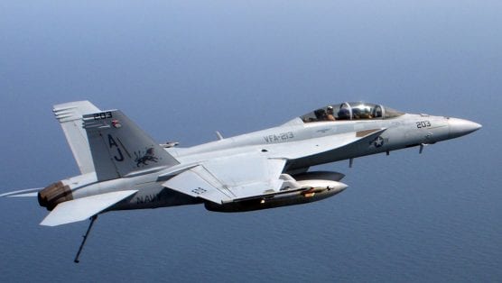 An F/A 18 Super Hornet, assigned to the "Blacklions" of Strike Fighter Squadron (VFA) 213, flies over the aircraft carrier USS Theodore Roosevelt (CVN 71) during flight operations. VFA-213 is assigned to Carrier Air Wing (CVW) 8, on Nov. 1, 2008. (U.S. Navy photo by Lt. Cmdr. Johnnie Caldwell-Released)