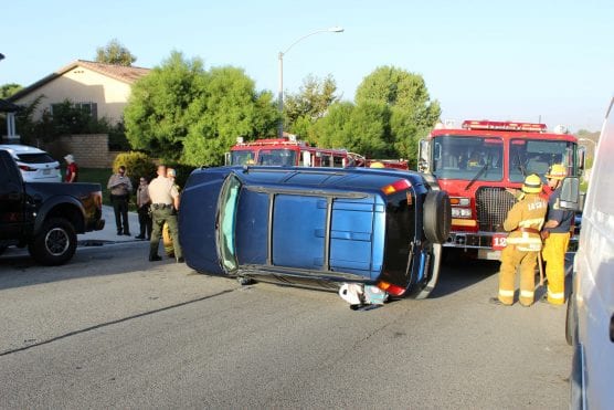 A teenage female driver escape serious injury when her van rolled onto its side on Dorothy Street in Saugus Friday morning. | Photo: Ryan Gilley/Two8Nine Media.