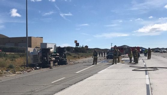 Firefighters at the scene of an overturned propane truck, leaking on the shoulder of Highway 14 near Acton. | Photo courtesy CHP.