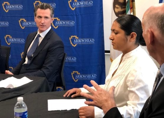 California Gov. Gavin Newsom speaks with Michelle Padilla, center, and Tod Lipka, right, about his revised state budget proposal that would boost funds for mental health services and emergency shelters for the homeless. | Photo: Martin Macias Jr./CNS.
