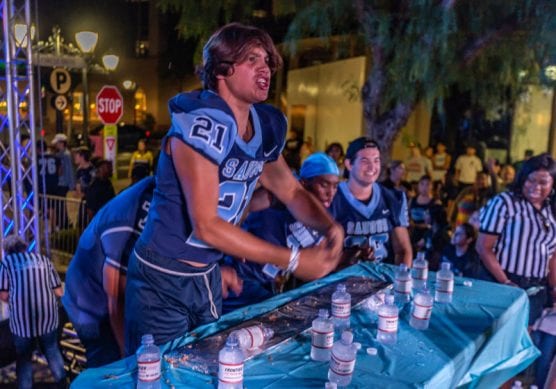 Saugus junior Julian Bornn reacts to finishing the four-foot burrito with four of his teammates at the 10th annual Burrito Bowl at the Westfield Valencia Town Center Tuesday night. | Photo: Cory Rubin/The Signal.