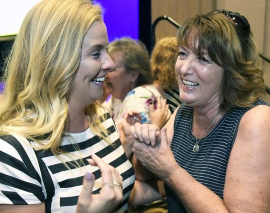 Teacher Ryan Smith, left, is surprised by her influential teacher Sally Hoffman during the Newhall School District "Welcome Back to School" event held at the Newhall Family Theater in Newhall on Tuesday, Aug. 27, 2019. | Photo: Dan Watson/The Signal.