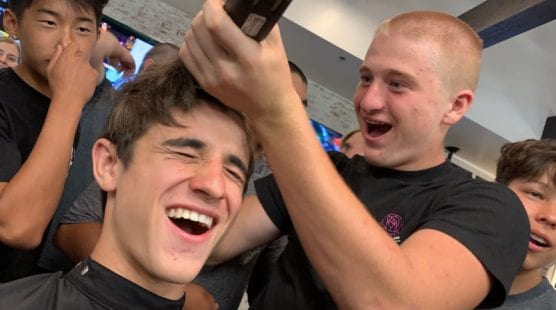 A Valencia High School junior varsity football player has his head shaved in support of Pedro Roman, a teammate diagnosed with leukemia last week. | Photo courtesy of Austin Dave.