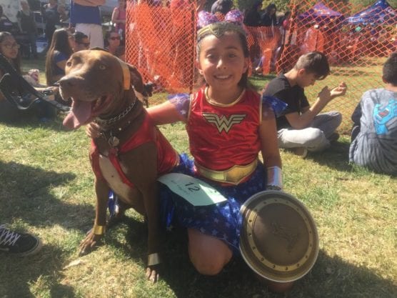 Audrey Ruiz and her dog Zuma both dressed as Wonder Woman and won the prize for best costume at the Bow-Wows & Meows Pet Fair. | Photo: Matt Fernandez/The Signal.