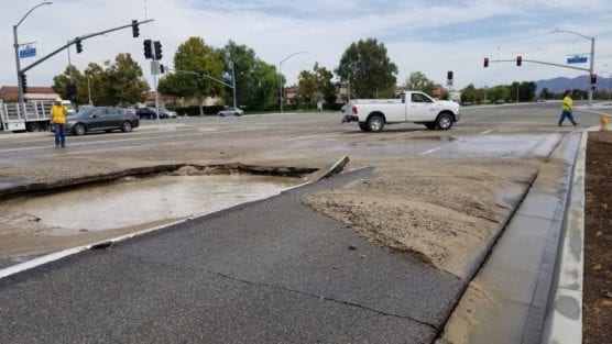 A water main break in Valencia caused lane closures and traffic delays as crews work to stop water from spilling onto the streets Wednesday. | Photo: Bobby Block/The Signal.