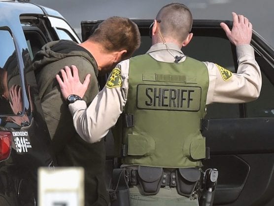 A man is taken into custody on the 14 Freeway near Golden Valley Road after evading Sheriff's deputies on a steep hill behind the Target retail store in Santa Clarita on Tuesday, November 26, 2019. | Photo: Dan Watson / The Signal.