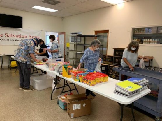 Volunteers Organizing Back to School Supplies