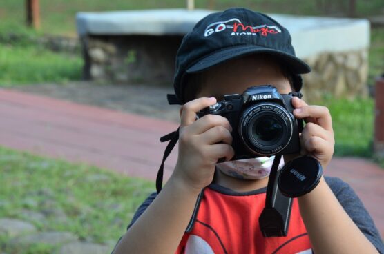 kid with camera